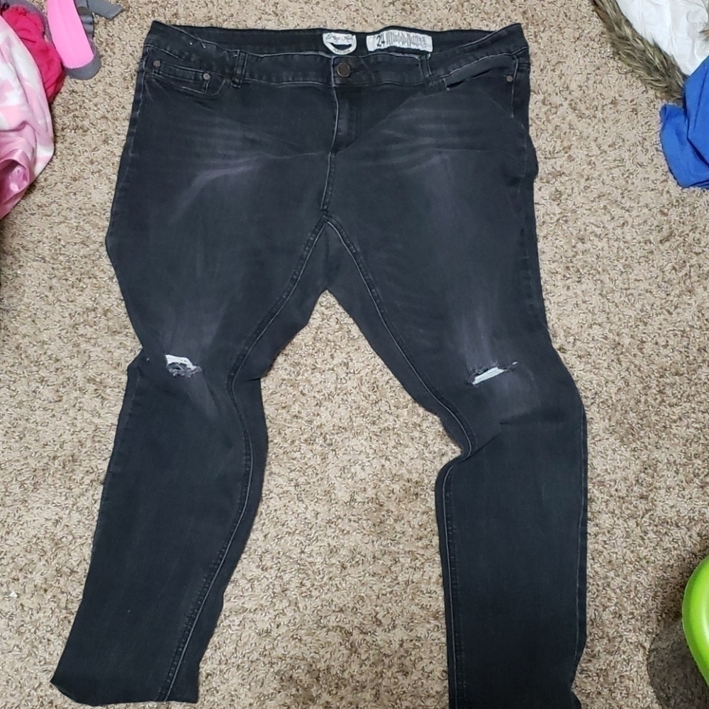 Black distressed skinny jeans. Size 24
